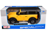 2021 Ford Bronco Badlands Yellow with Black Top "Special Edition" 1/24 Diecast Model by Maisto