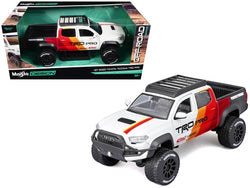 2023 Toyota Tacoma TRD PRO Off Road Pickup Truck White with Graphics and Roof Rack "Maisto Design" Series 1/27 Diecast Model Maisto