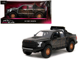 2017 Ford F-150 Raptor Pickup Truck Black with Gold Graphics "Pink Slips" Series 1/24 Diecast Model by Jada