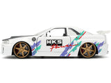 2002 Nissan Skyline GT-R (R34) RHD (Right Hand Drive) "HKS Power" White with Carbon Hood and Graphics "JDM Tuners" Series 1/24 Diecast Model Car by Jada
