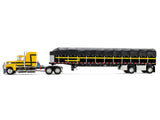 Ford LTL 9000 with 60" Aerodyne Sleeper and 53' Wilson Roadbrute Flatbed Trailer with Covered Wagon Yellow with Black Stripes 1/64 Diecast Model by DCP/First Gear