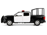 2017 Chevrolet Silverado 1500 LT Z71 Crew Cab Pickup Truck with Bed Cage Black and White with Flashing Light Bar and Front and Rear Lights and Sounds 1/27 Diecast Model Car by Motormax