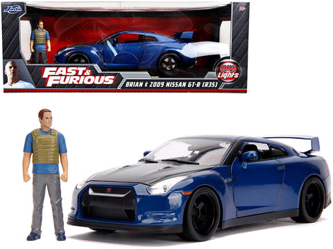 2009 Nissan GT-R (R35) Blue Metallic and Carbon with Lights and Brian Figure "Fast & Furious" Movie 1/18 Diecast Model Car by Jada