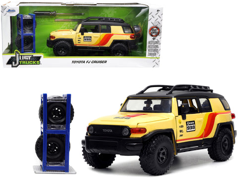Toyota FJ Cruiser #938 Cream with Matte Black Top with Roof Rack and Stripes "KC Hilites" with Extra Wheels "Just Trucks" Series 1/24 Diecast Model by Jada