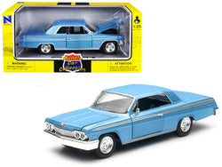 1962 Chevrolet Impala SS Blue 1/25 Diecast Model Car by New Ray