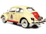 1963 Volkswagen Beetle Yukon Yellow with "Monopoly" Graphics "Free Parking" and Mr. Monopoly Resin Figure 1/18 Diecast Model Car by Autoworld