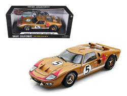1966 Ford GT-40 MK 2 (Right Hand Drive) #5 Gold 24 Hours of Le Mans 1/18 Diecast Model Car by Shelby Collectibles
