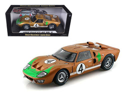 1966 Ford GT-40 MK 2 Gold #4 1/18 Diecast Model Car by Shelby Collectibles