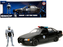 Ford Taurus OCP Matte Black "Detroit Police" and Robocop Diecast Figure 35th Anniversary "Robocop" (1987) Movie "Hollywood Rides" Series 1/24 Diecast Model Car by Jada